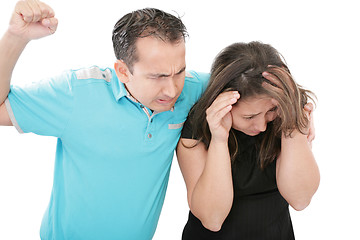 Image showing Terrified abused woman trying to stop the attack and defend hers