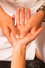 Image showing Massaging a palm