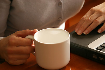 Image showing having a coffee break