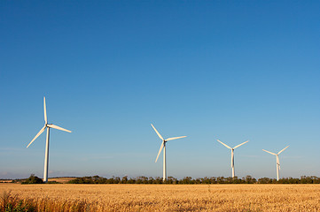 Image showing Four windmills