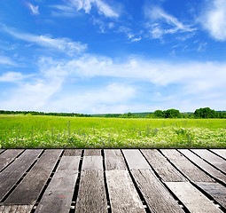 Image showing blue sky and wood floor background