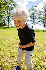 Image showing Boy jumping outdoors