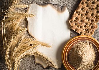 Image showing Wheat ears on vintage background 