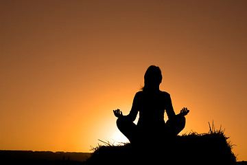 Image showing Woman making yoga