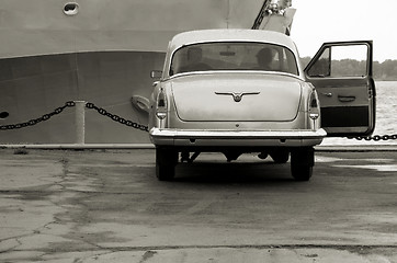 Image showing in rainy day car,ship near mooring line