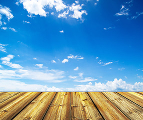 Image showing blue sky and wood floor background