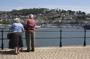 Image showing elderly couple looking towards kingswear