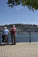 Image showing elderly couple looking towards kingswear