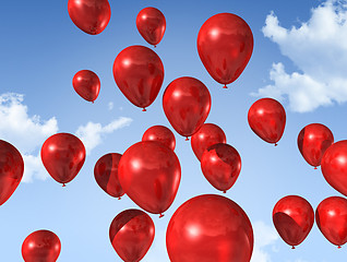 Image showing red balloons on a blue sky