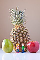 Image showing Girl and Boy Overwhelmed by Nutrition Choices (Fruit)