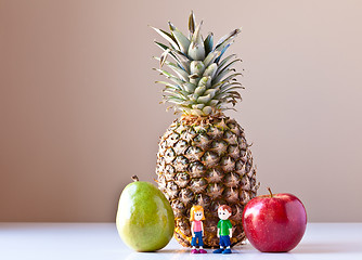 Image showing Girl and Boy Overwhelmed by Nutrition Choices (Fruit)