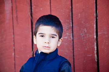 Image showing Serious Little Boy Making Eye Contact