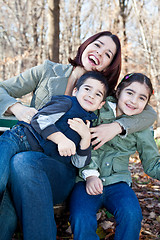 Image showing Laughing Mother Hugging Her Children