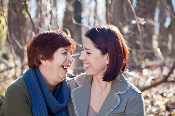 Image showing Portrait of Laughing Adult Mother and Daughter