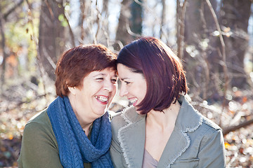Image showing Portrait of Laughing Adult Mother and Daughter