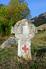 Image showing old cross with touristic sign