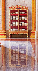 Image showing Decorated case with books for meditation.