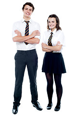 Image showing Students in uniform posing with arms crossed