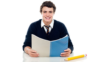 Image showing Studious boy preparing for half yearly exams