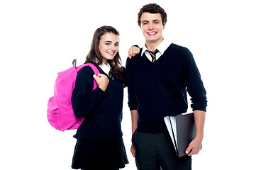 Image showing Girl resting her arm on classmates shoulder