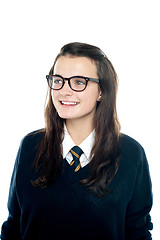 Image showing Portrait of smiling young schoolgirl looking away