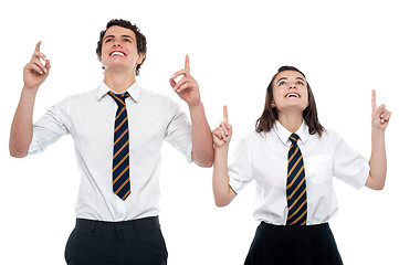 Image showing Schoolmates looking and pointing upwards