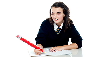 Image showing Confident school girl is ready to take up the test