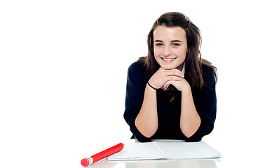 Image showing Attractive confident young schoolgirl posing