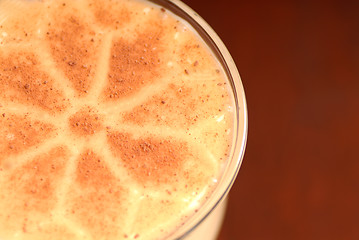 Image showing Overhead view of glass of eggnog with nutmeg
