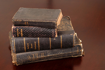 Image showing Stack of old bibles including German bibles