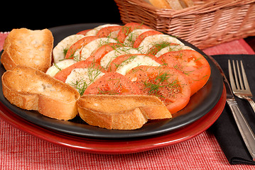 Image showing A fennel and tomato salad with crostini