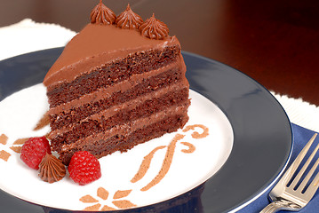 Image showing Delicious 4 layer chocolate cake with raspberries