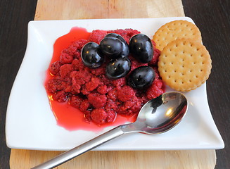 Image showing raspberry with grapes and biscuits