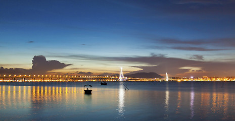 Image showing Sunset bridge along the coast 