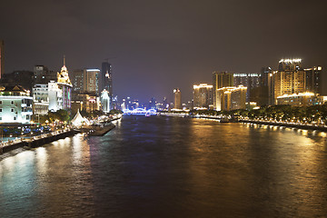 Image showing Zhujiang River and modern buildings at night in Guangzhou, China