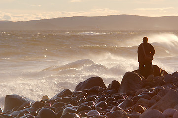 Image showing Person on a rocky beach.