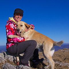 Image showing Girl and her dog