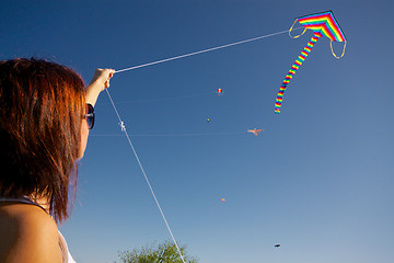 Image showing Girl playing with kite