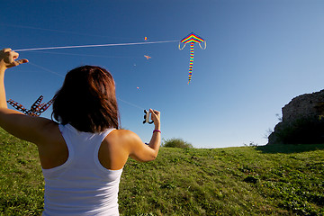 Image showing Girl with flying kite