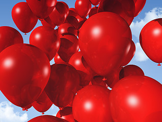 Image showing red balloons on a blue sky