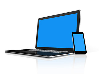 Image showing Mobile phone on a laptop
