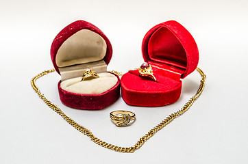 Image showing Gold Ring and Necklace on other side
