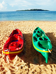 Image showing Couple kayaks on the shore