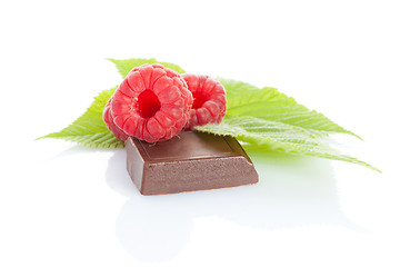 Image showing ripe raspberry on chocolate bar