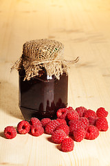 Image showing jelly jar on wooden table