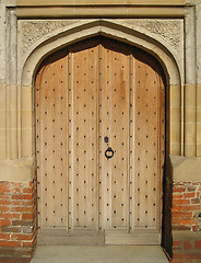 Image showing Wooden church door.