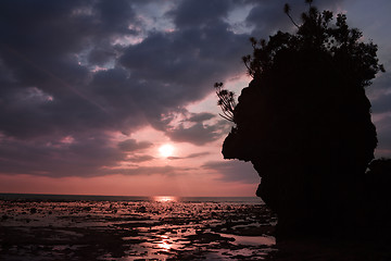 Image showing sunset horizon with cliff silhouette