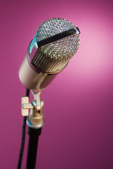 Image showing sparkling microphone waiting for star