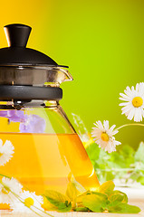 Image showing teapot with hot herbal tea