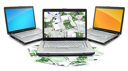 Image showing Open laptop with money 